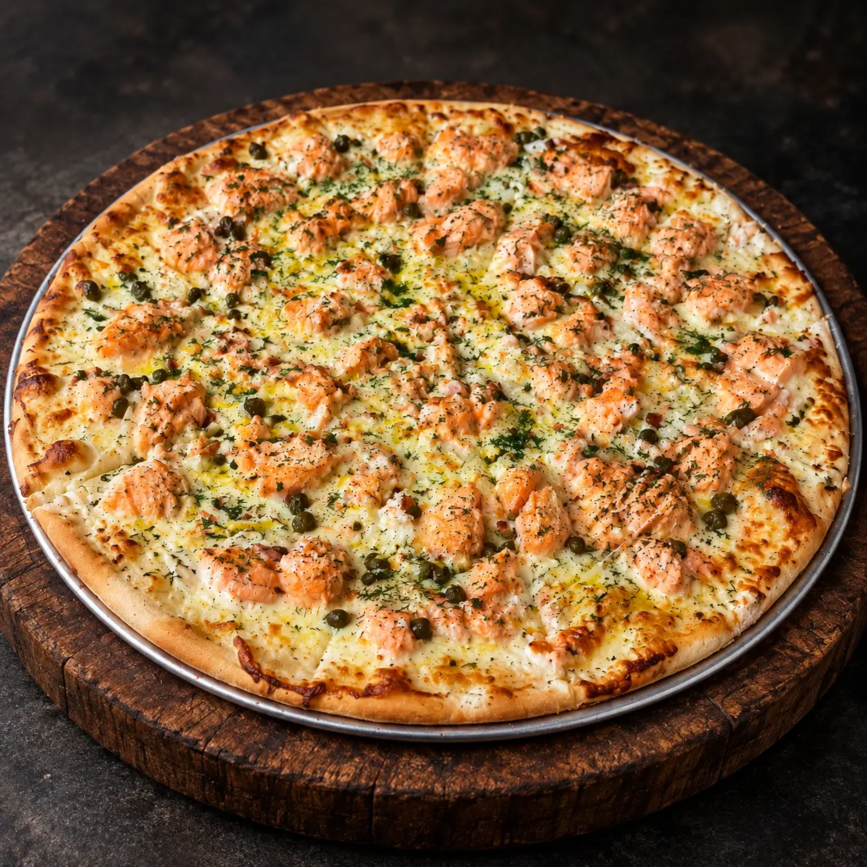 PizzAventuras Salmon Pizza with cream cheese, onion, capers and dill